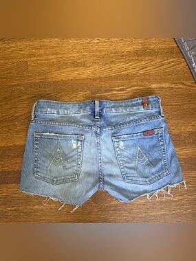 7 for All Mankind “A” pocket low-rise distressed cut off denim shorts Sz. 27